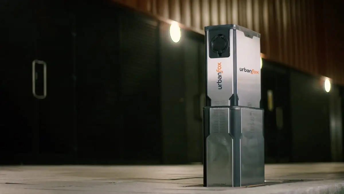 An Urban Fox UEone chargepoint on a street at night